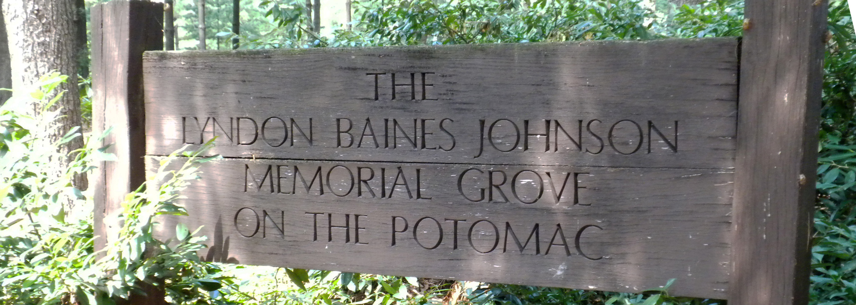 Wooden entrance sign for the Lyndon Baines Johnson Memorial Grove on the Potomac